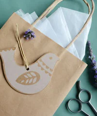 Kraft paper bag with Dove gift tag