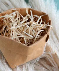 Wood wool in a washable paper sack