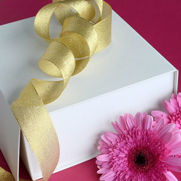 White linen-textured magnetic lid box with 38mm gold taffeta ribbon